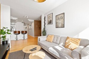 Fall in love with the seamless flow and natural light of this open living room design.