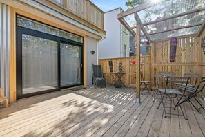 Sip your morning coffee on our sun-kissed patio overlooking the peaceful neighborhood.