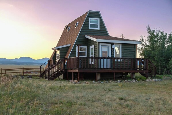 Enjoy breahtaking sunsets at The Hilltop A-Frame!