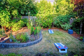 Picture perfect backyard whether you want to relax or enjoy some activities!