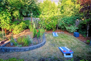 Picture perfect backyard whether you want to relax or enjoy some activities!
