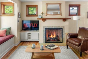 Cozy up by the fire and stream your favorites on the Smart TV with Netflix!