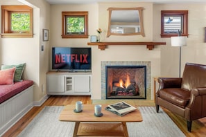 Cozy up by the fire and stream your favorites on the Smart TV with Netflix!