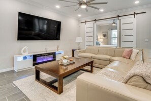 Living Room | Electric Fireplace | 85" Smart TV w/ Netflix