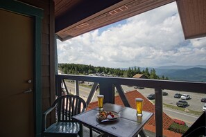 View of the Village Parking area, valley and mountains in the background