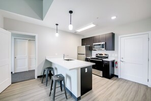 Kitchen | Single-Story Apartment | Central Heating & A/C