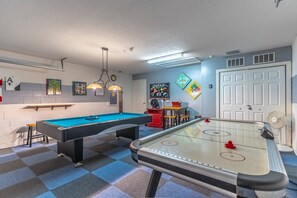 Game room with Air hockey and pool!