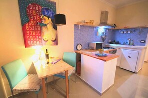 Dunja Apartments - Comfort Apartment - Dining area and kitchen