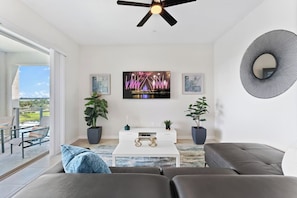 Living Room TV #Disney #Parks #kingdom #springs #StoreyLake #resort #Apartment #Vacation #Rental #waterpark #Kissimmee #Orlando #universal #citywalk