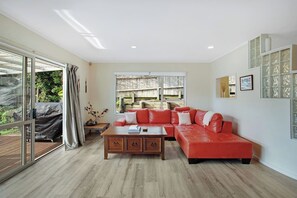The lounge area is comfy with a large lounge suite to relax on.