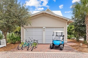 Bikes and a gold cart for easy ride to beach