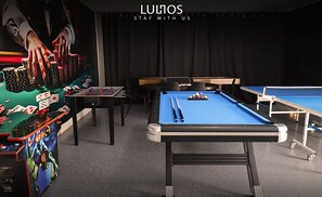 Playful vibes meet sleek design in this gamer’s paradise.