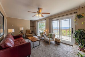 Living room with plenty of seating and breathtaking views.