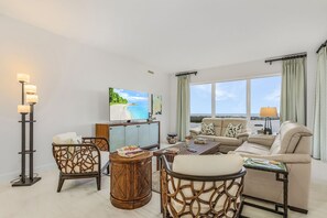 Beautifully appointed living room, with stunning views of Estero Bay and the Gulf of Mexico.