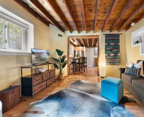 "Cozy living room with rustic and modern touches."