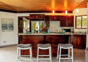 A beautifully designed kitchen with striking features and modern touches.