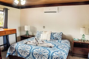 Master Bedroom with king-size bed, A/C and ceiling fan. 