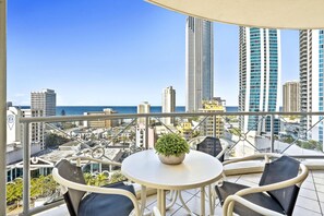 Enjoy your morning coffee in this spacious balcony overlooking the ocean/city