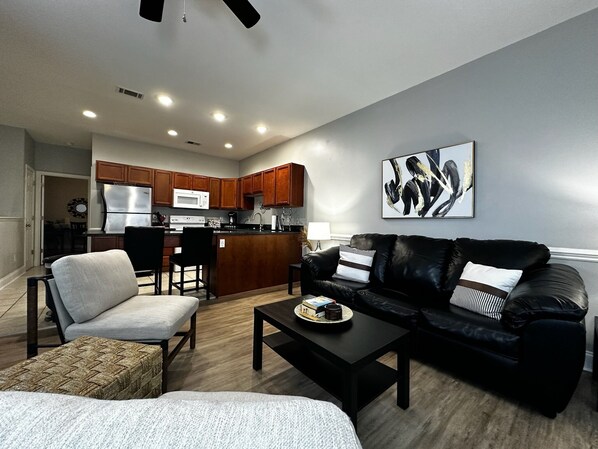 Relax in a cozy living room with a super comfy couch. Perfect for unwinding after a day of adventure!