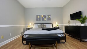 Retreat to elegance! Our master bedroom features a cozy TV for the ultimate comfy and relaxing stay!