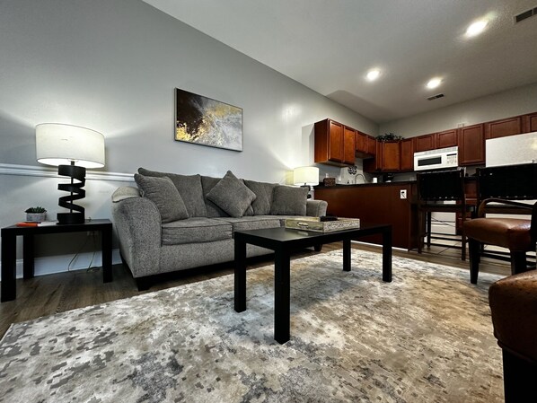 Chill in Comfort: Enjoy Our Inviting Living Room with a Cozy Couch!