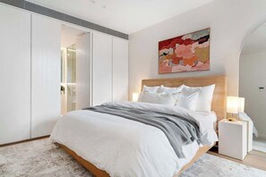 The King master bedroom, with wardrobes and ensuite