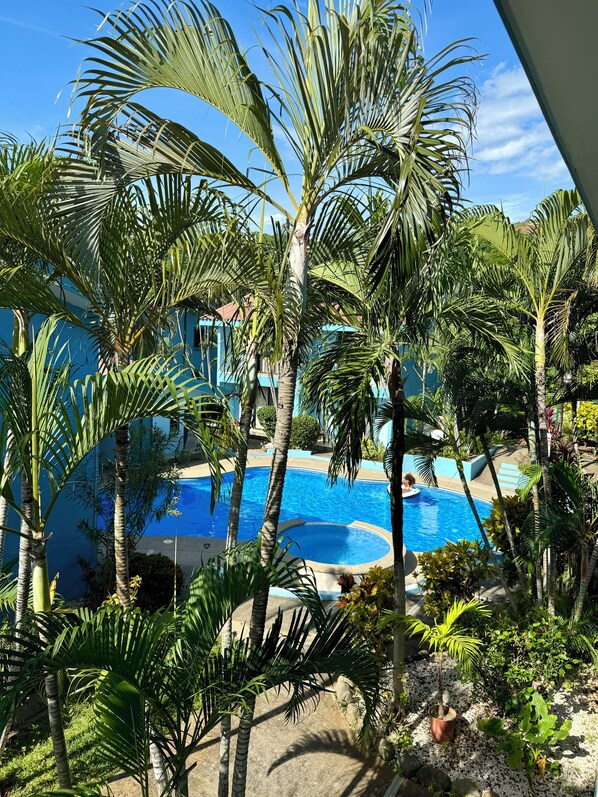 View of pool from second floor floor bedroom balcony 