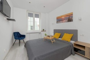 Bedroom with a double bed and wardrobe.
