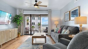 Boot up the Smart TV so you don’t miss your favorite shows! Extend your living space with the shaded balcony just off of the living room.