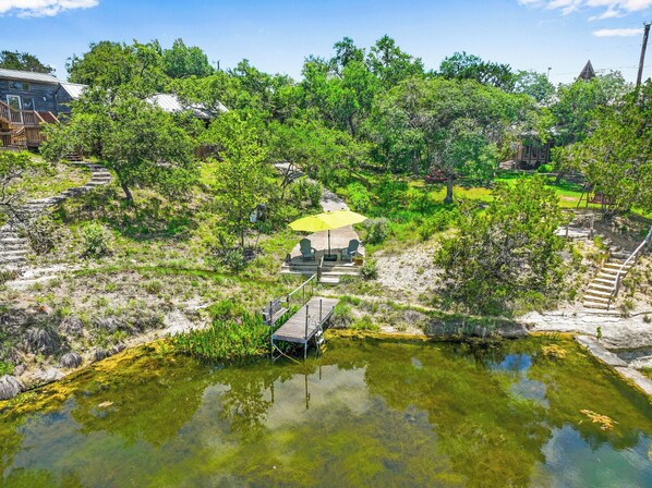 Aerial view of the creek right behind the home.