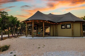 Front photo of the Jungalow with covered outdoor seating.