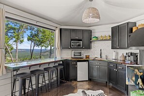 Savor a meal and the view from the barstool seating