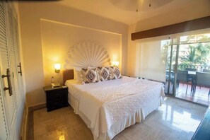 Master bedroom with ensuite bathroom, king size bed, mini split AC, closet, etc