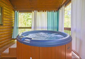 Melt away stress in the hot tub, an ideal spot for evening relaxation under the stars.