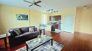 The cozy living room is designed for relaxation and entertainment.