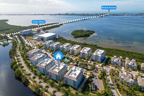 Coastal Bliss is on a private island 2 minute drive over the bridge to Manatee Beach!