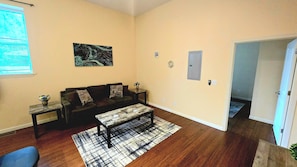The cozy living room is designed for relaxation and entertainment.