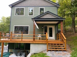 Newly stained front entrance to main level of house