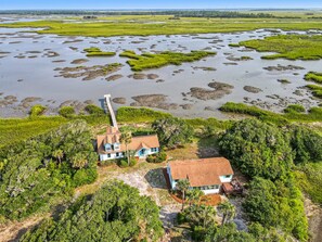 Welcome to The Fort! Your own private island, with 360* Marsh Views and steps away, down a private road, to the beach.