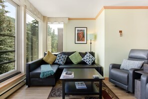 Enjoy the sun soaked living room with a full wall of windows.