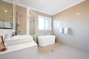 Bathroom 2 - Shower, Bath + Toilet