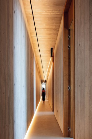 A grand, elongated hallway that stretches invitingly before you.