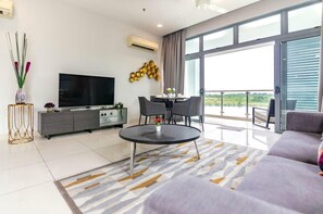 Tastefully furnished living area with a balcony.
