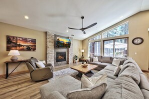 Enjoy movie night on the large HDTV above the gas fireplace with plenty of seating