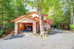 Property Exterior | Golf Cart Access | Balcony w/ Patio Seating