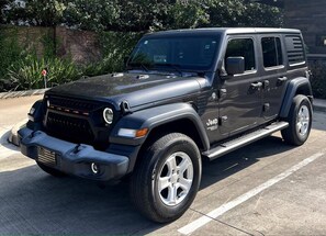 Option to rent Jeep Wrangler, $100/day with free delivery to the airport garage before your arrival