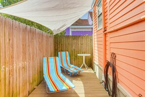 Fenced-In Patio | Outdoor Seating & Dining | Table Umbrella