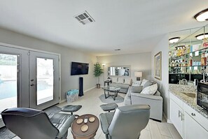 Spacious living area #2 with TV open to the kitchen