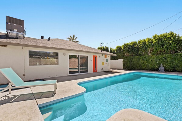 Relax and unwind in the poolside oasis
