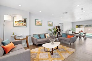 Living area with cozy seating and Smart TV